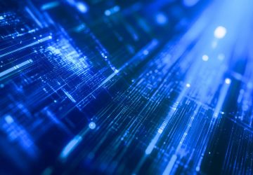 Blue fiber optic cables with light streams representing modern IBM i API integration and data flow technology