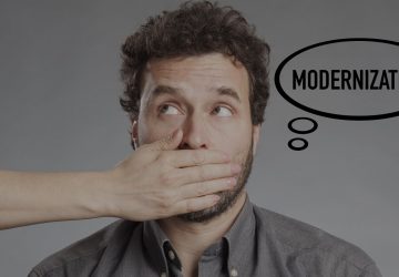 Business professional silenced from saying modernization, representing focus on business solutions over IT terminology