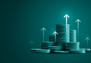 Stacks of coins with upward arrows representing EDI cost savings and predictable pricing growth