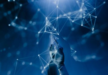 Robotic hand reaching toward connected network nodes representing AI-powered application integration technology